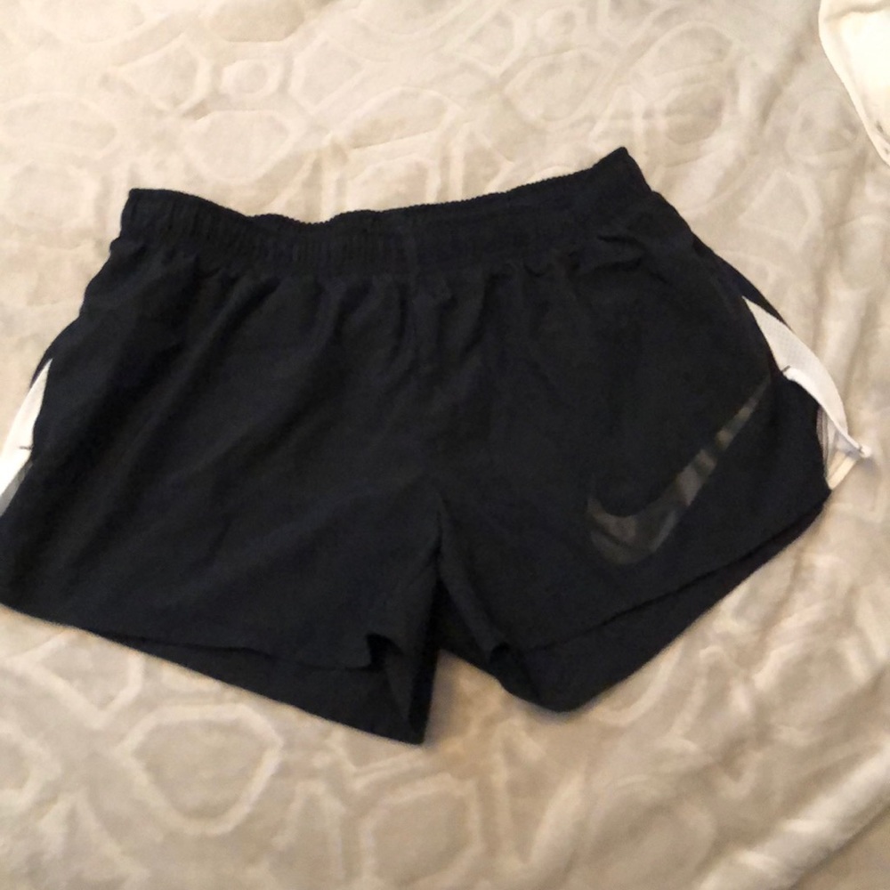 Black Nike running shorts